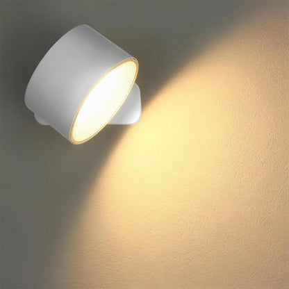 Nook cordless wall lamp in white, switched on, on a plain wall