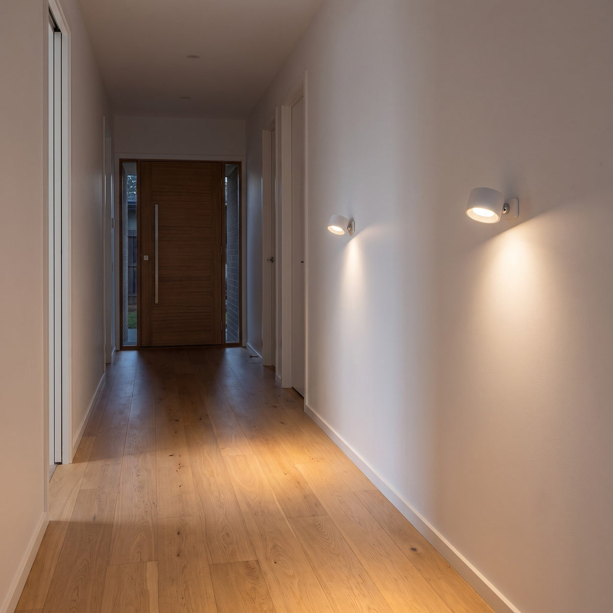White Nook lamps in a hallway