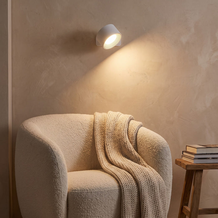 White Nook lamp above a reading chair