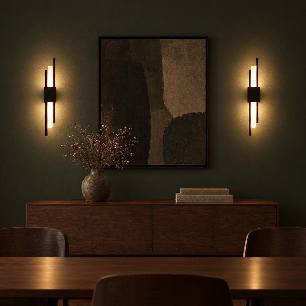 A pair of black Nook Duo Sconces on a dark green wall