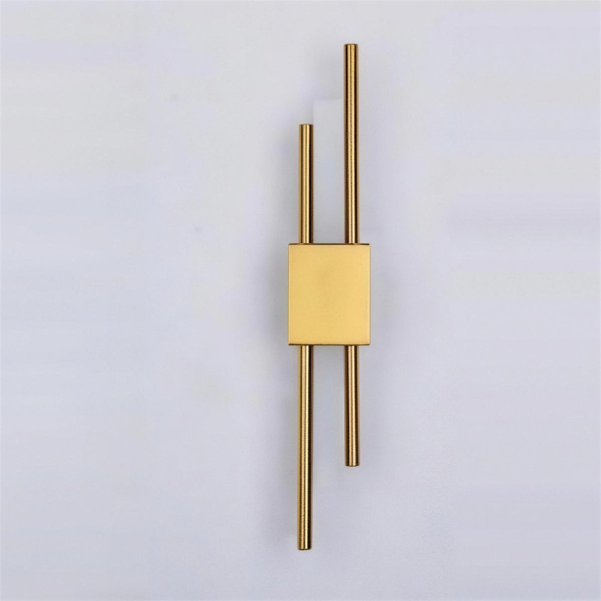 Nook Duo Sconce in gold, switched off